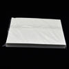 A stack of 50 sheets of white A4 edible wafer paper for cake decorating.