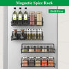 A black magnetic spice rack with multiple tiers holding various glass jars of spices inside a refrigerator.