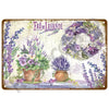 Vintage metal tin sign featuring lavender flowers and a wreath, suitable for garden or home decor.