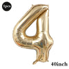 A gold foil number balloon shaped like the number 4, used for birthday and party decoration.