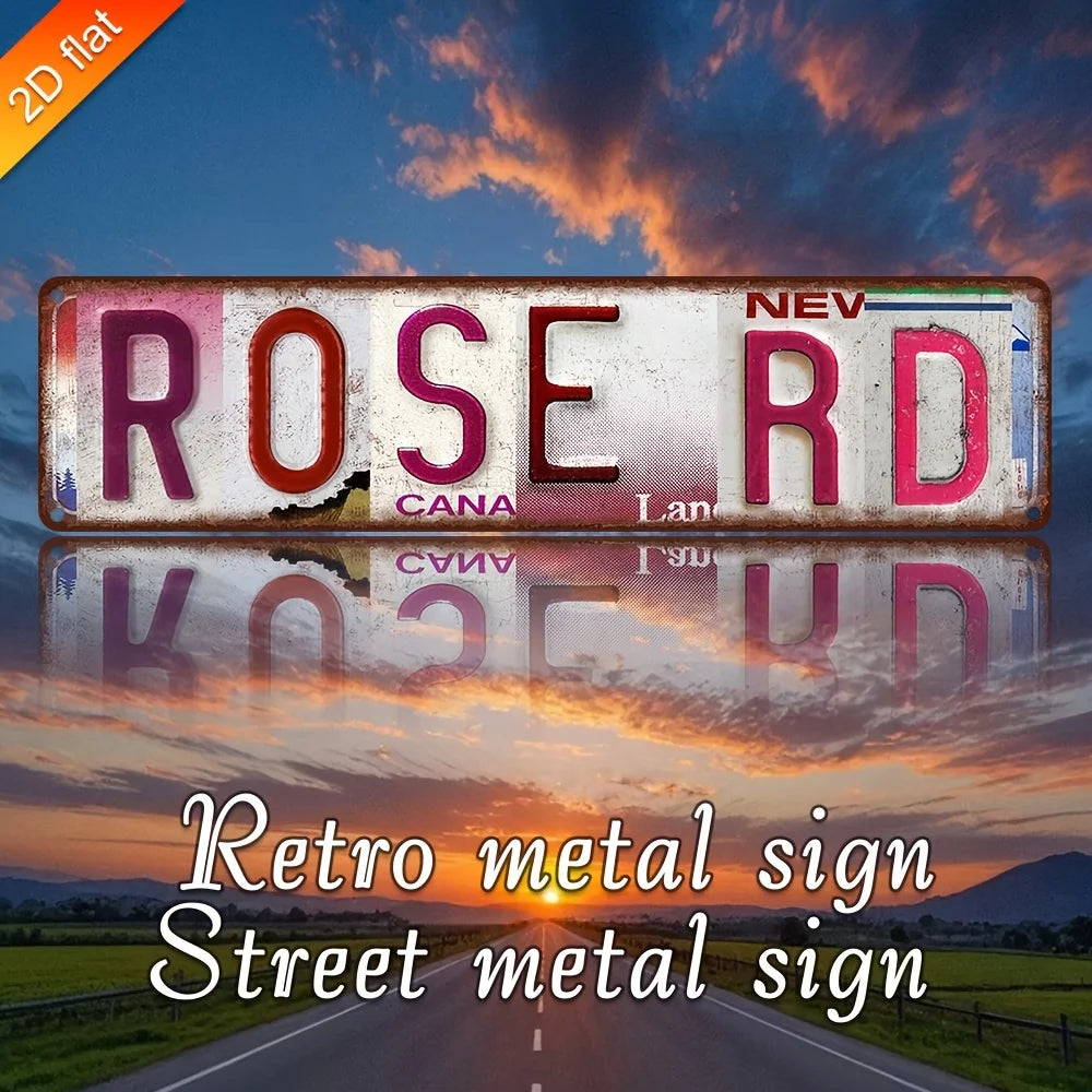 Vintage retro Metallstraßenschild für Rose Rd in rötlich-pinkem Ton gegen einen Sonnenuntergangshimmel.