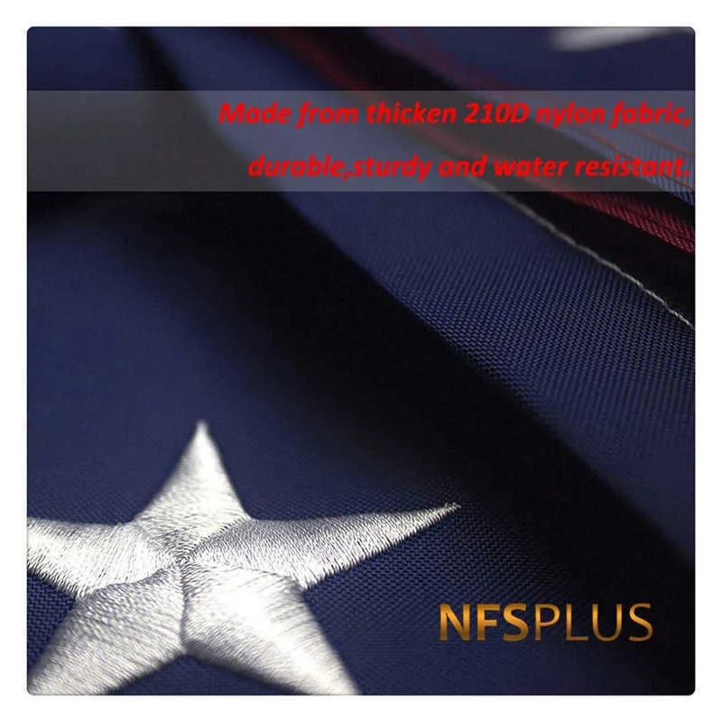 Close-up of a dark blue fabric with a silver star design and the text NFSPLUS