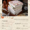 A stack of vintage patterned paper material books and a wooden box are displayed with production information text.