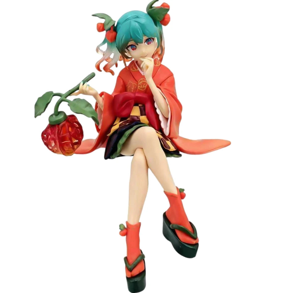 Gothic Lolita Miku Action Fairy Doll with teal hair and orange outfit holding a red fruit