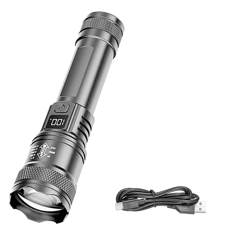 A silver compact flashlight with a textured lens and battery compartment is shown next to its charging cable.