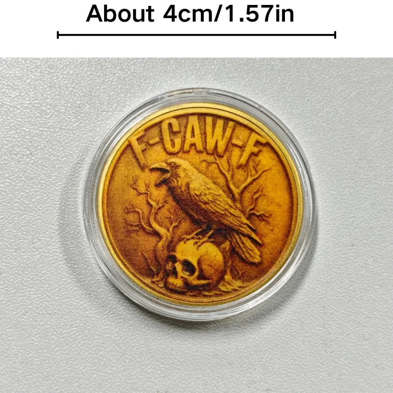 A round gold-toned challenge coin featuring a crow and skull design.
