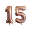 Gold silver black helium foil number balloons spelling out fifteen