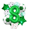 A collection of green and silver foil balloons shaped like numbers and soccer balls for birthday party decorations