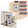 A set of rustic wooden photo frames in various sizes and finishes displayed on a surface.
