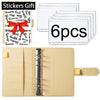 A set of stickers with a red bow and a budget planner binder for organizing finances