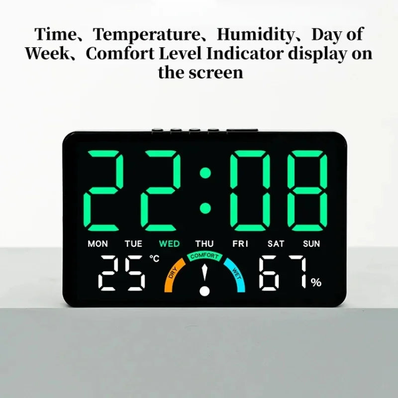 Digital alarm clock displaying time, temperature, humidity, day of the week, and comfort level indicator.