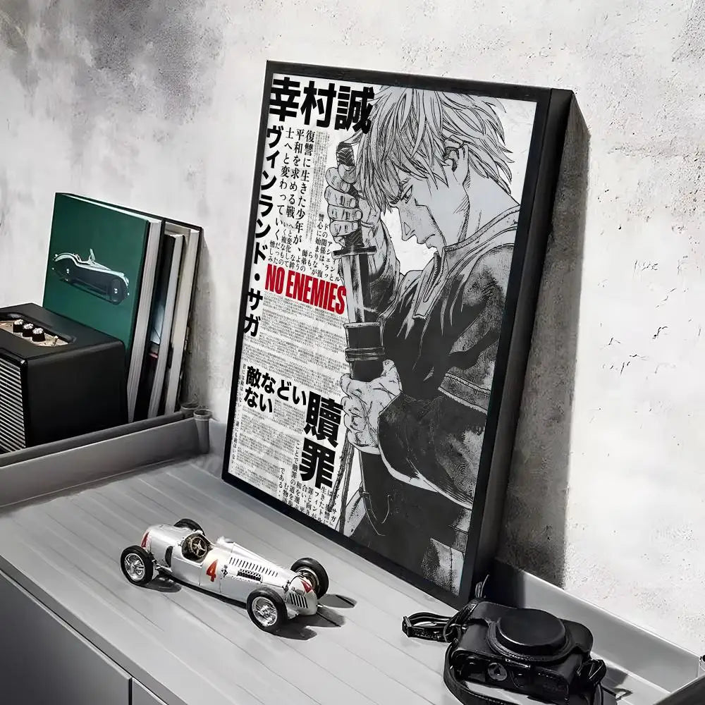 A framed poster of a Vinland Saga anime character with a matte finish, displayed on a shelf.