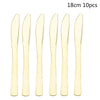 A set of 10 disposable party forks with gold accents.