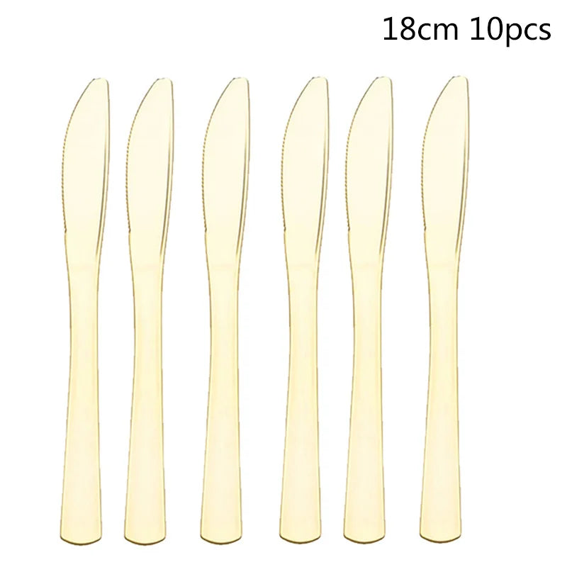A set of 10 disposable party forks with gold accents.