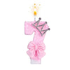 Pink bow crown number 1 candle with a lit flame