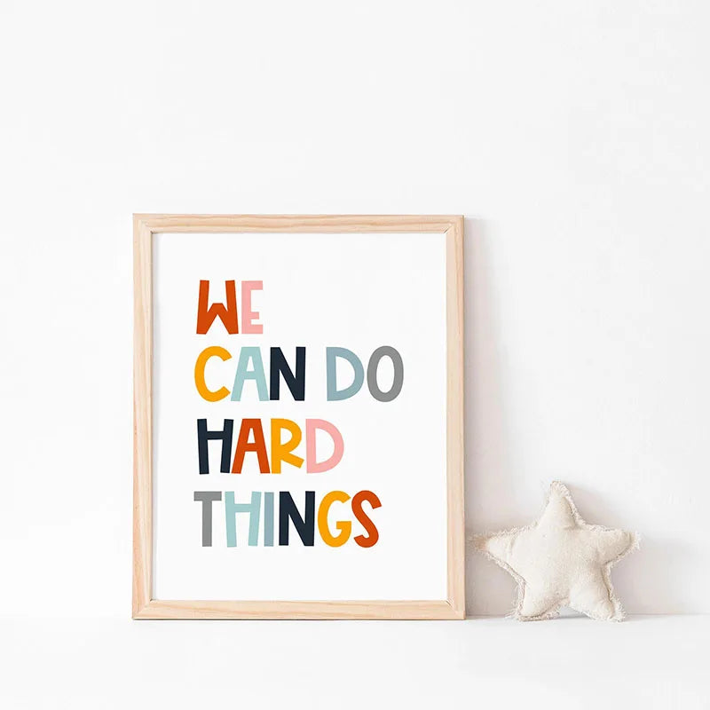 Framed canvas wall art with the inspirational quote We can do hard things in colorful block letters