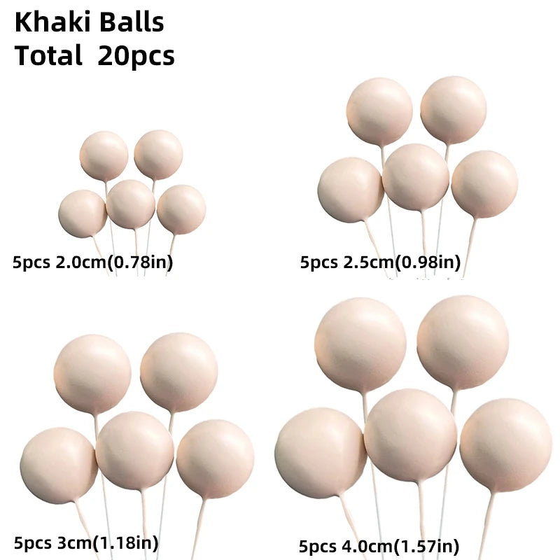 A collection of khaki colored balloons and cake toppers in various sizes, including 2cm, 2.5cm, and 3cm.