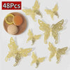 A set of 48 gold and silver metallic 3D hollow butterfly wall stickers displayed with a slice of lemon and an egg.