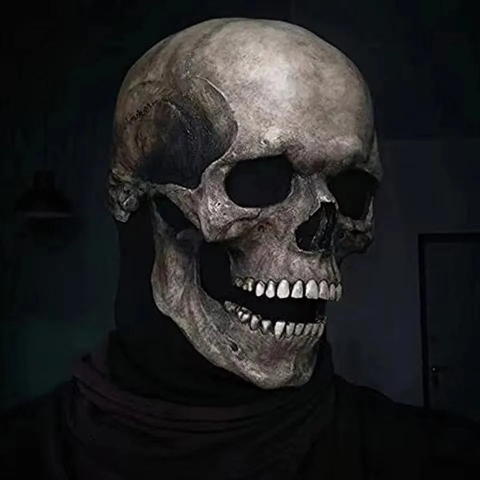 A realistic full-head skull mask with a movable jaw, displayed against a dark background.