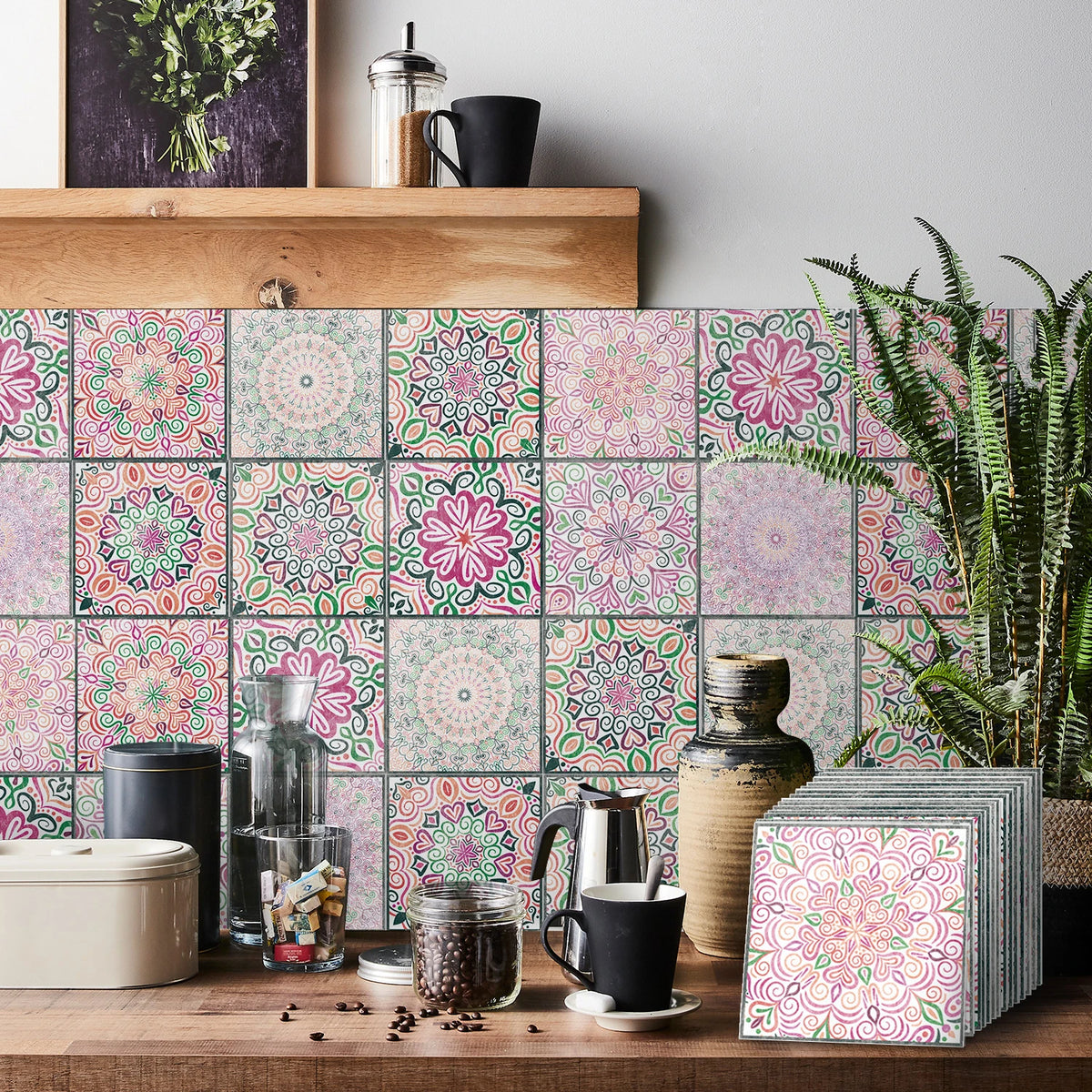 A close-up of a kitchen backsplash featuring colorful floral and geometric tile wall stickers.