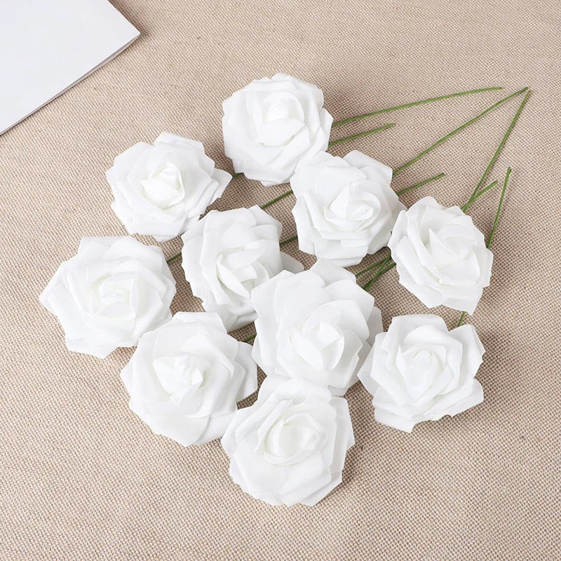 A collection of twenty white foam rose stems used for weddings and home decor