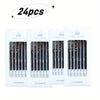 A set of 24 gradient blue metallic birthday candles packaged in individual boxes.
