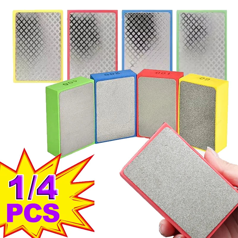 A collection of diamond hand polishing pads in various colors and sizes, including green, blue, red, and yellow.