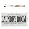 A wooden laundry room sign featuring the words laundry room wash dry fold repeat carved into the wood.