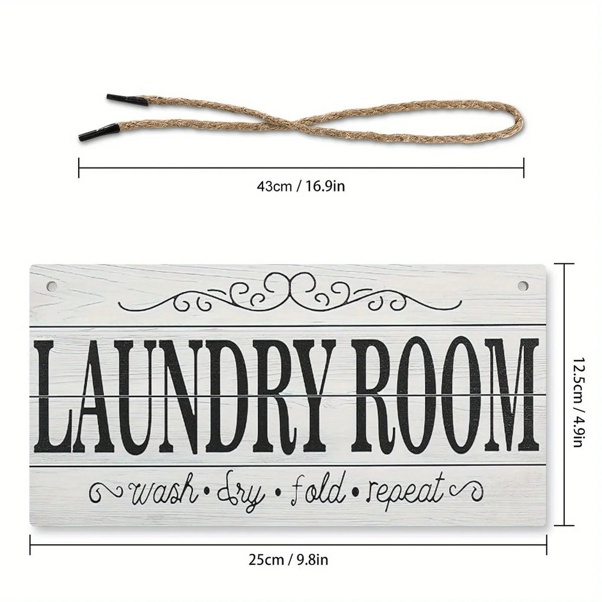 A wooden laundry room sign featuring the words laundry room wash dry fold repeat carved into the wood.