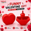 A red 3D printed heart box with a finger poking out, presented as a funny Valentine gift surprise.