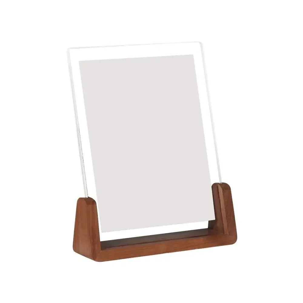Walnut wood and acrylic photo frame for desktop display with a clear glass panel.