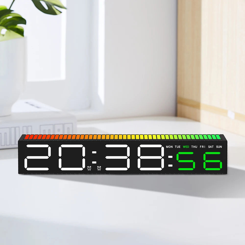 A black LED digital alarm clock displaying 20:38:56 with a green display, resting on a white surface.