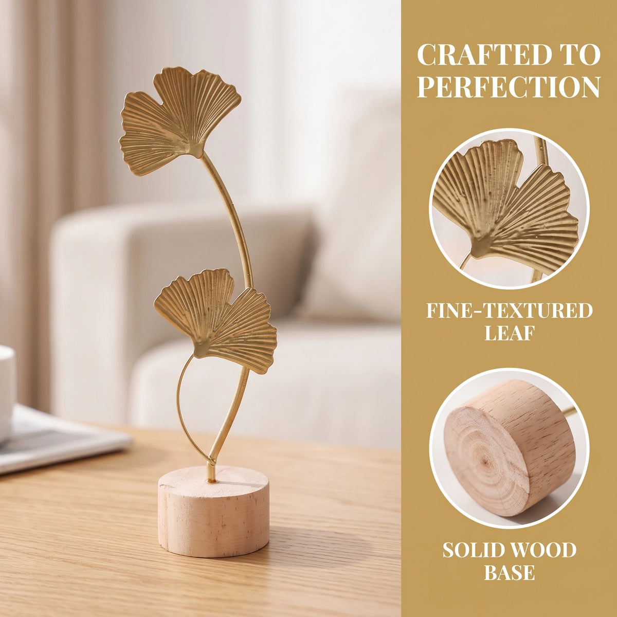 A golden ginkgo leaf ornament crafted from wood stands on a wooden base.