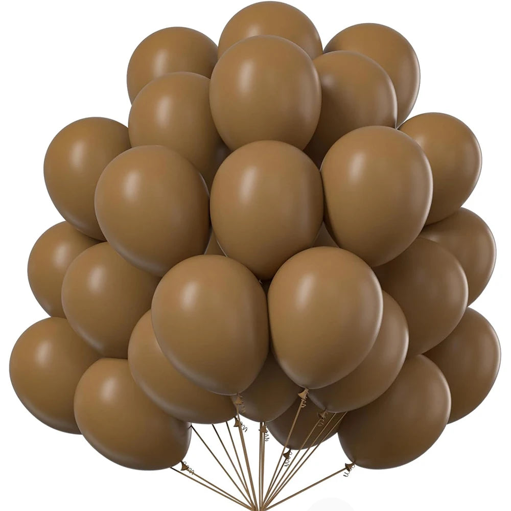 A bunch of matte orange latex balloons tied together for party or wedding decor