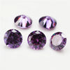 A collection of round cut purple and pink cubic zirconia loose stones for jewelry making.
