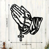 Black silhouette of an open hand holding a prayer cross, metal wall art for Christian decor