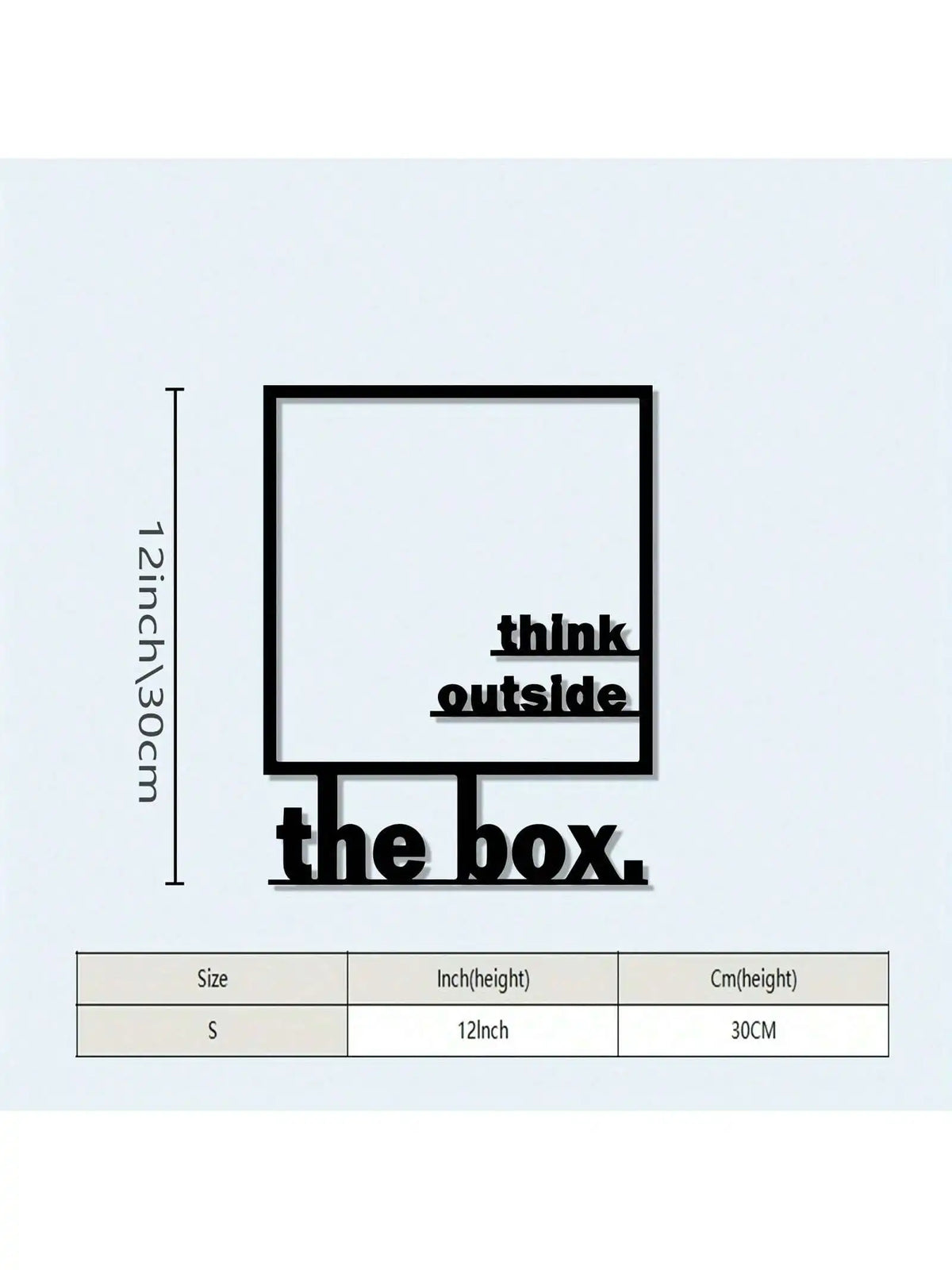 Black metal wall decor featuring a box outline with the text think outside the box.