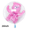 A pink foil balloon shaped like a teddy bear with glitter details and the words Baby Girl printed on it.