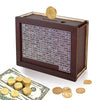 A wooden piggy bank with a slot, surrounded by gold coins and banknotes.