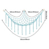 A light blue cotton corner toy hammock for stuffed animals and plushies, featuring a curved design with hanging strands.