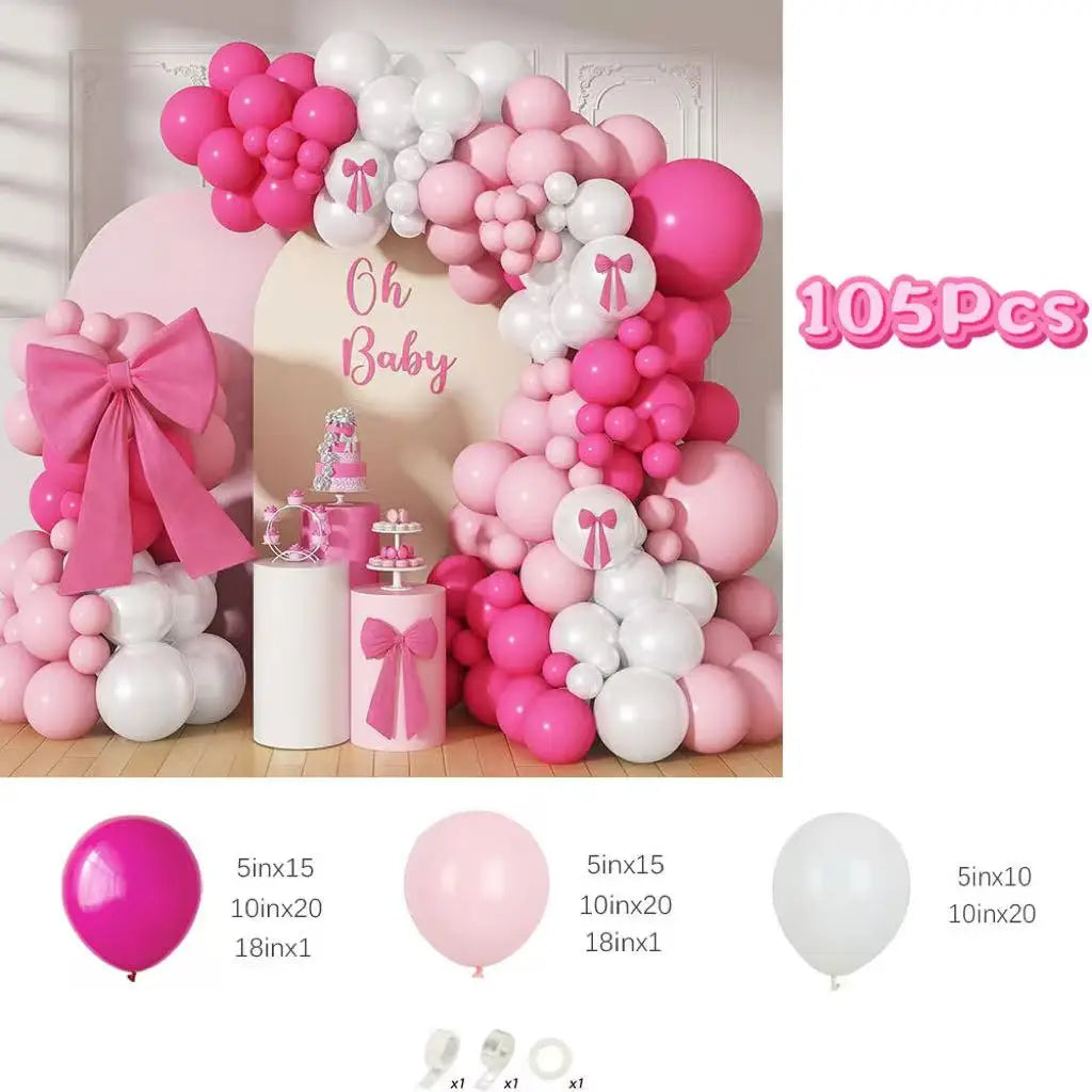 A large arrangement of pink and white balloons used for a baby party decoration set