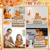 A set of rustic wooden maple leaf tiered trays displaying autumn themes like pumpkin spice, falling leaves, and apple cider.