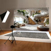 A white and green natural cave backdrop featuring a stone staircase and tropical plants for photography