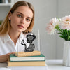 A woman holds an acrylic positive affirmation desk decor sign featuring the text You Are Strong Beautiful Amazing Talented Po
