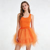 A young woman models an orange sleeveless top and a matching orange tulle tutu skirt.