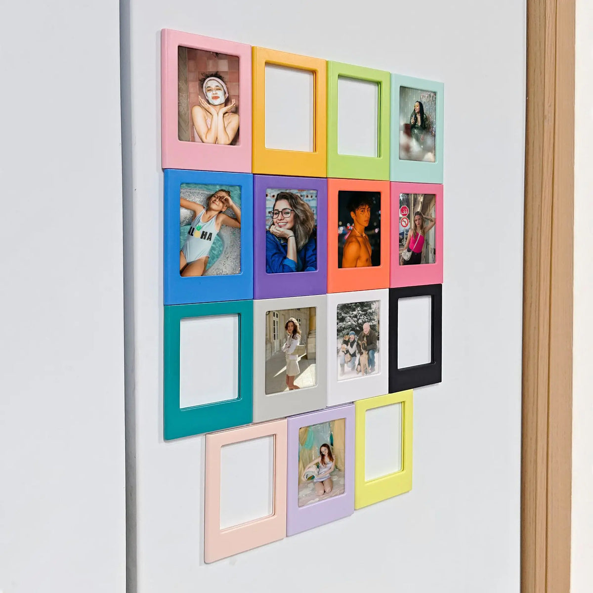 A collection of colorful magnetic mini photo frames arranged in a grid on a white background.