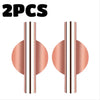 Two modern wall-mounted flower vases with a rose gold finish and striped design.