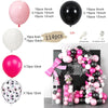 Balloon garland arch kit featuring black and pink balloons with starburst foil accents for decoration