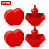 Two red 3D printed heart surprise boxes with a finger gesture inside