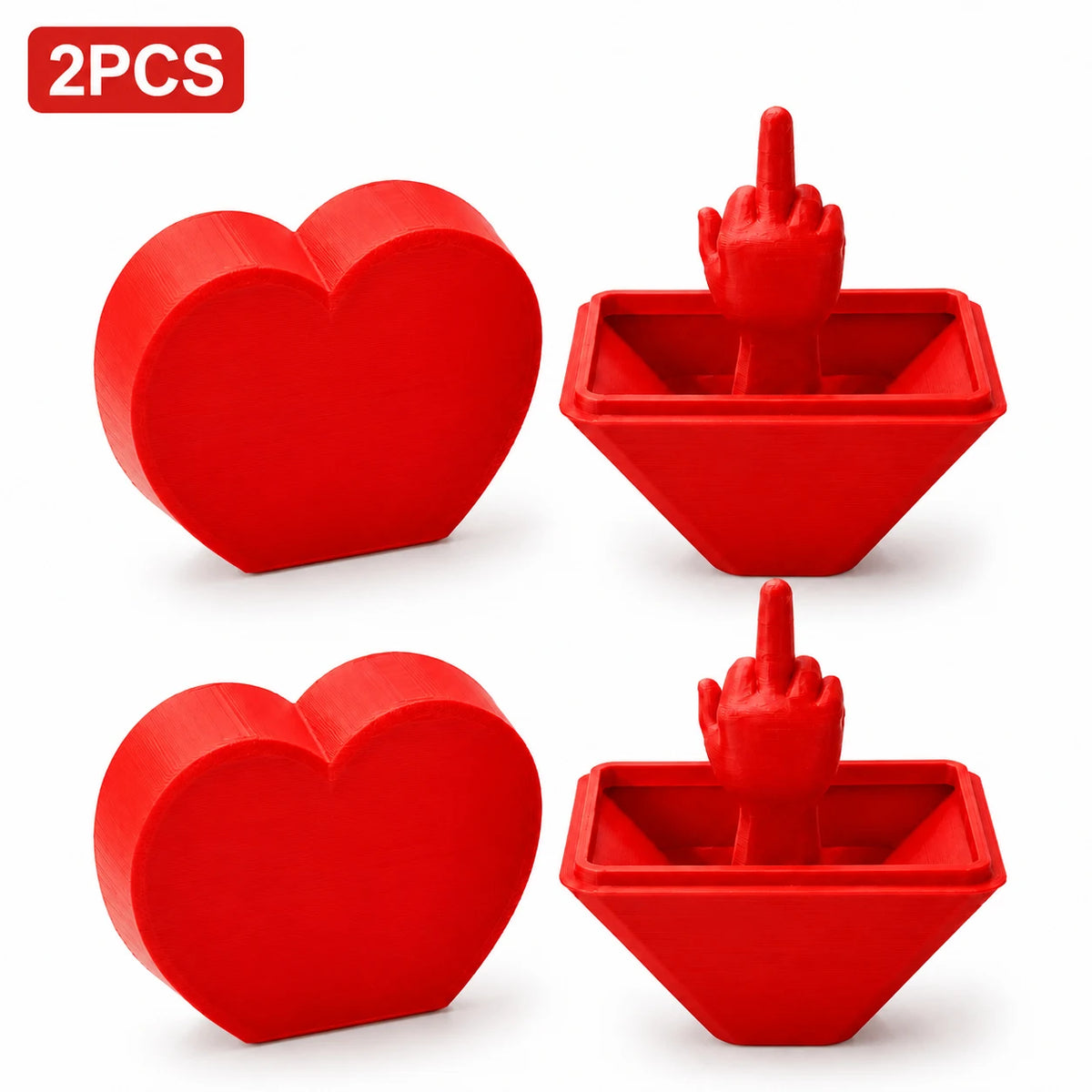 Two red 3D printed heart surprise boxes with a finger gesture inside